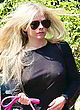 Avril Lavigne exposing her boobs in public pics