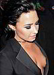 Demi Lovato visible breast in black blazer pics