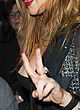 Lindsay Lohan exposing her breast, public pics