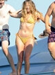 Margot Robbie wore a showy yellow bikini pics