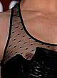 Milla Jovovich naked pics - visible nipples in black dress