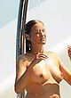 Yasmin Le Bon exposing her boobs on yacht pics