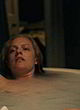Elisabeth Moss naked pics - lying and shows her sexy tits