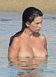 Penelope Cruz shows her breasts in water pics