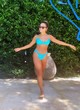 Vanessa Hudgens stuns in neon blue bikini pics