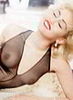 Miley Cyrus naked pics - shows tits for magazine