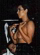 Kim Kardashian naked pics - shows her boobs during ps