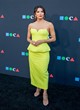 Eva Longoria posing in glam green dress pics