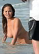 Chrissy Teigen posing nude for photoshoot pics