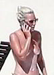 Lady Gaga sunbathing her sexy boobs pics