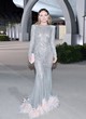 Olivia Wilde stuns in a sheer silver gown pics