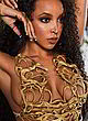 Tinashe visible sexy tits in gold top pics