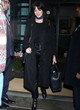 Anne Hathaway wore a long black coat pics
