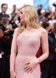Elle Fanning posing in a pink gown pics