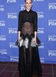 Kristen Stewart stuns in black sheer dress pics
