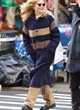 Meg Ryan wore a navy tweed winter coat pics
