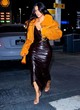 Kim Kardashian naked pics - looks chic in leather dress