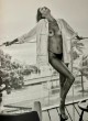 Alessandra Ambrosio topless on a balcony pics