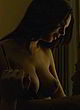 Emily Ratajkowski displays her tits in movie pics