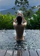 Alexandra Daddario nude in her pool pics