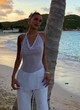 Bella Hadid posing in white sheer top pics