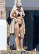 Miley Cyrus turns up the heat in bikini pics
