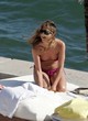 Jennifer Aniston relaxing poolside in miami pics