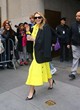 Elizabeth Olsen wows in yellow midi dress pics