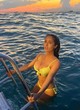 Salma Hayek posing in yellow bikini pics