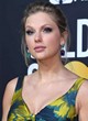 Taylor Swift shows her bust in floral gown pics