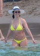 Britney Spears stuns in neon yellow bikini pics