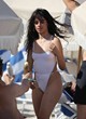 Camila Cabello models a white swimsuit pics