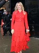 Hilary Duff wows in a bright red dress pics
