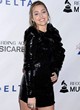 Miley Cyrus shines in a little black dress pics