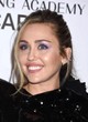 Miley Cyrus wows all in black mini dress pics