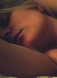 Natalya Anisimova naked pics - lying and exposes tits in bed