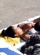 Nicole Scherzinger shows boob on the beach pics