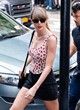 Taylor Swift shows cleavage in floral top pics