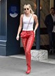 Miley Cyrus wows in red pants and boots pics