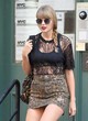 Taylor Swift rocks a leopard print skirt pics
