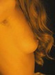 Nora Arnezeder undressing, shows small tits pics