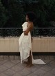 Zoe Saldana naked pics - flashing her butt on balcony