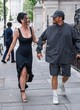 Katy Perry shows cleavage in black dress pics