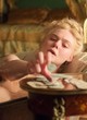 Elle Fanning naked pics - lying and displays boobs