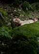 Diane Rouxel lying on the ground, nude tits pics