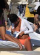 Jessica Aidi flashing boob on the beach pics