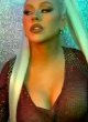 Christina Aguilera naked pics - drops massive cleavage