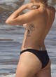 Miley Cyrus naked pics - topless in water at hawaii