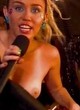Miley Cyrus naked pics - flashing boob in backstage