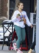 Kristen Bell wows in green leggings pics